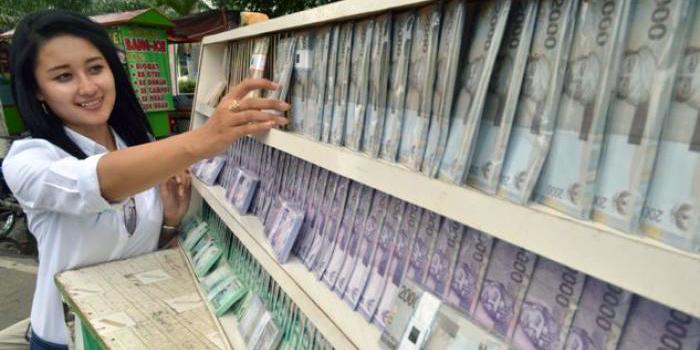 Lapak Tukar Uang Baru di Malang (C) TRIBUNNEWS