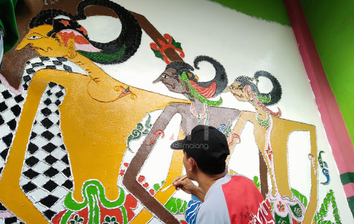 Salah satu mural Kampung Wayang di Pisang Candi Malang (C) PHOTOMALANG