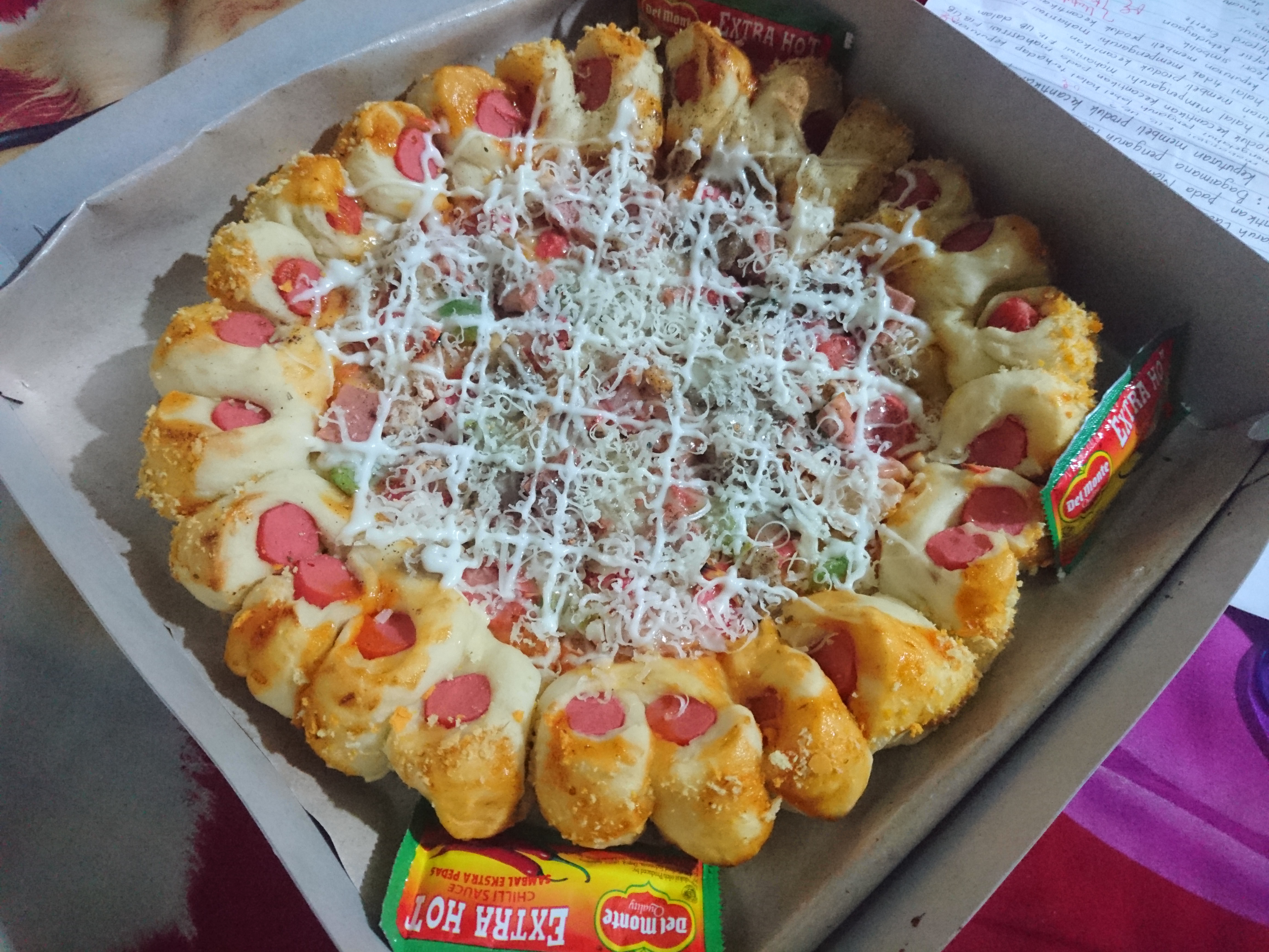 Penampakan pizza berdiameter 26 cm dari Pizza Kanelop yang dibandrol harga Rp 40.000 saja. (Foto: Riska Suci Rahmawati)